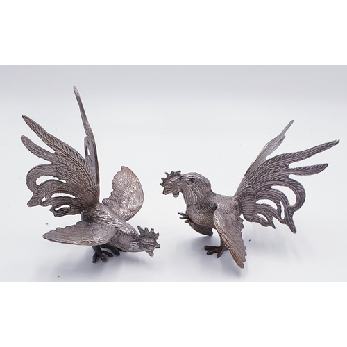 76 - SILVER PLATED MODELS OF TWO FIGHTING COCKS