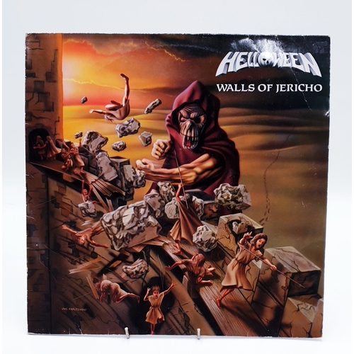 125 - HEAVY METAL VINYL ALBUMS Plus 12 inch (4)
(Three Lps and One 12 inch.)
( Helloween Lp+ inner. Ratt L... 