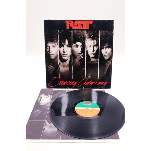 125 - HEAVY METAL VINYL ALBUMS Plus 12 inch (4)
(Three Lps and One 12 inch.)
( Helloween Lp+ inner. Ratt L... 