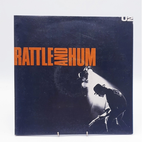 127 - U2 VINYL ALBUMS Plus 12 inch (3)
(Two Lps Plus One 12 inch.)
(Rattle and Hum gatefold 2Lp + inners. ... 