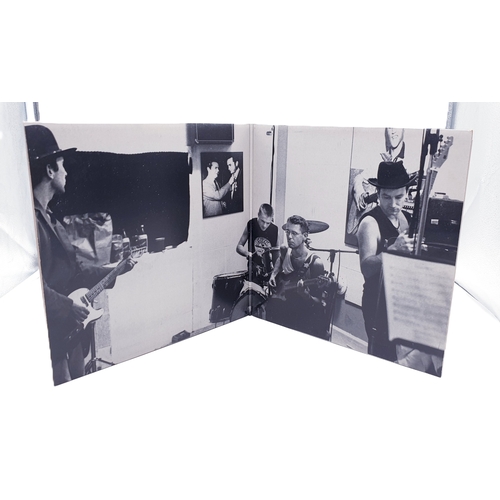 127 - U2 VINYL ALBUMS Plus 12 inch (3)
(Two Lps Plus One 12 inch.)
(Rattle and Hum gatefold 2Lp + inners. ... 