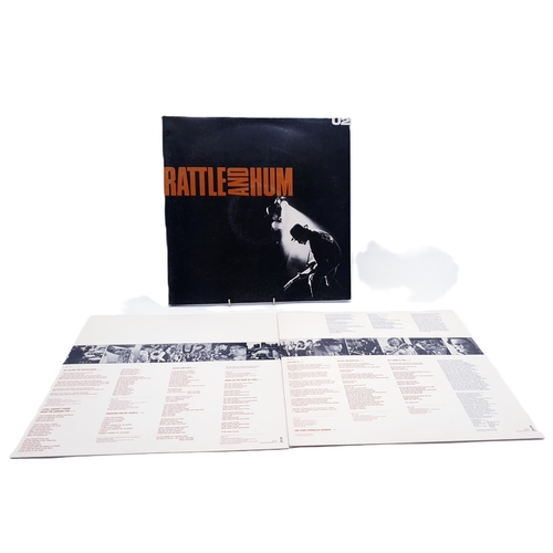 127 - U2 VINYL ALBUMS Plus 12 inch (3)
(Two Lps Plus One 12 inch.)
(Rattle and Hum gatefold 2Lp + inners. ... 