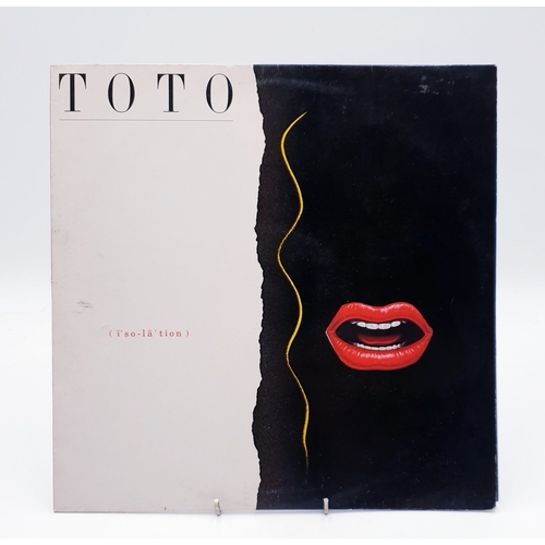 128 - TOTO VINYL ALBUMS Plus 12 inch (4)
(Three Albums Plus One 12 inch.)
( Isolation Lp+ inner. Toto Lp a... 