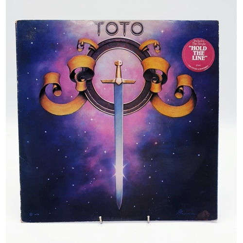 131 - HARD ROCK VINYL ALBUMS (5)
(Magnum Vintage Magnum Lp. Toto Self Ttitled Lp and insert. Toto IV Lp. T... 