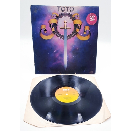 131 - HARD ROCK VINYL ALBUMS (5)
(Magnum Vintage Magnum Lp. Toto Self Ttitled Lp and insert. Toto IV Lp. T... 