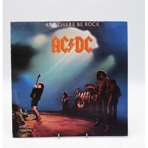 132 - AC/DC VINYL ALBUM (1)
(Let There Be Rock. Germany reissue Lp with Crabsody In Blue (replaced with Pr... 