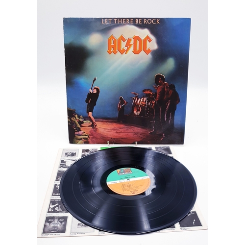 132 - AC/DC VINYL ALBUM (1)
(Let There Be Rock. Germany reissue Lp with Crabsody In Blue (replaced with Pr... 