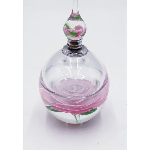 141 - GLASS ROSE PATTERN PERFUME BOTTLE WITH STOPPER And WHITE METAL COLLAR