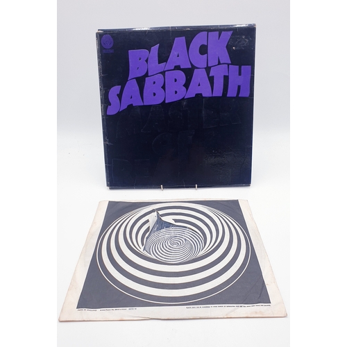 238 - Black Sabbath Vinyl LPs (2)
Master Of Reality Vertigo Swirl with the box cover and swirl inner. Para... 