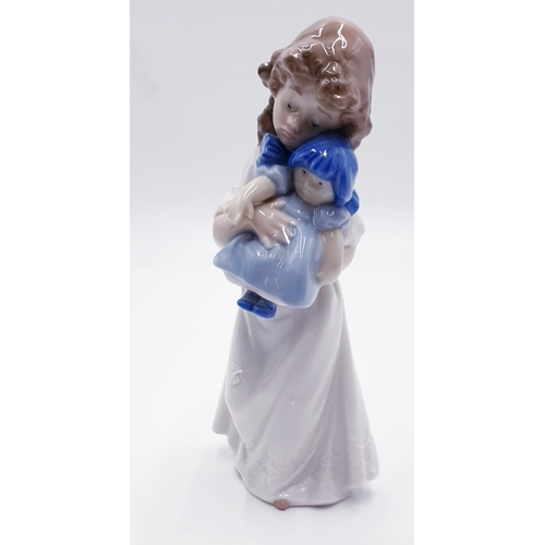 295 - LLADRO (Nao) PORCELAIN CHARACTER FIGURINE OF A YOUNG GIRL With RAG DOLL 