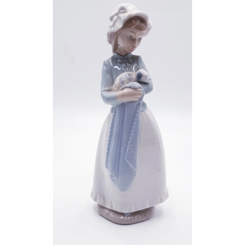 296 - LLADRO (Nao) PORCELAIN 25 cm CHARACTER FIGURINE OF A YOUNG GIRL HOLDING HER PUPPY