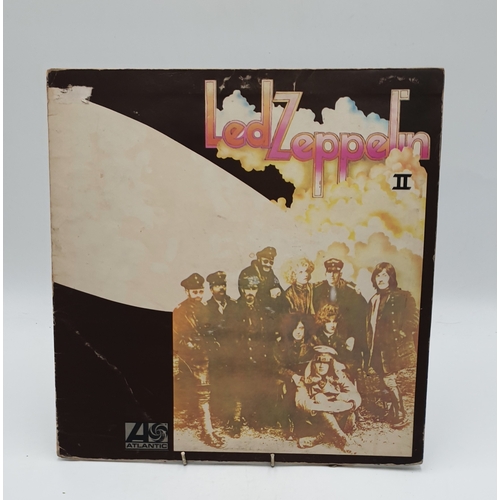 374 - ROCK VINYL ALBUMS (4)
Led Zeppelin self-titled USA issue. Led Zeppelin II gatefold sleeve (damaged).... 