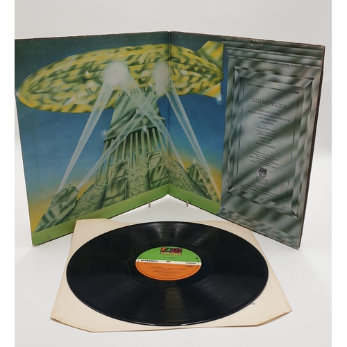 374 - ROCK VINYL ALBUMS (4)
Led Zeppelin self-titled USA issue. Led Zeppelin II gatefold sleeve (damaged).... 