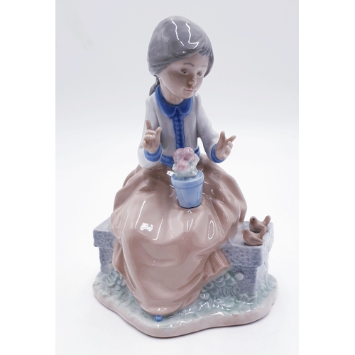 385 - LLADRO (Nao) 17cm CHARACTER FIGURINE OF A YOUNG GIRL With FLOWER POT And BIRDS