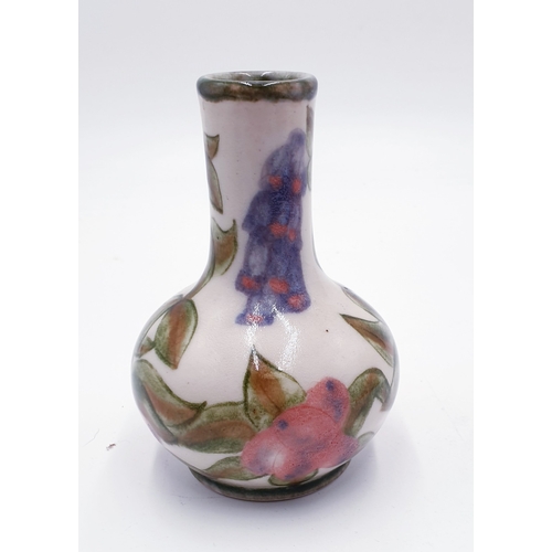 393 - COBRIDGE STONEWARE 11.5cm VASE.
(Cobridge Stoneware was a short-lived pottery company born out of th... 