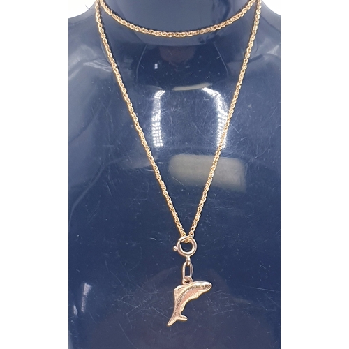 457 - 9ct GOLD (375) PENDANT FASHIONED AS A DOLPHIN ON A 9ct GOLD 46cm NECK CHAIN (Total Weight 2.00 Grams... 