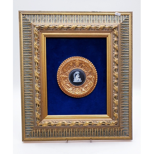 787 - BLACK JASPER CAMEO MOUNTED IN A 35cm x 40cm FRAME