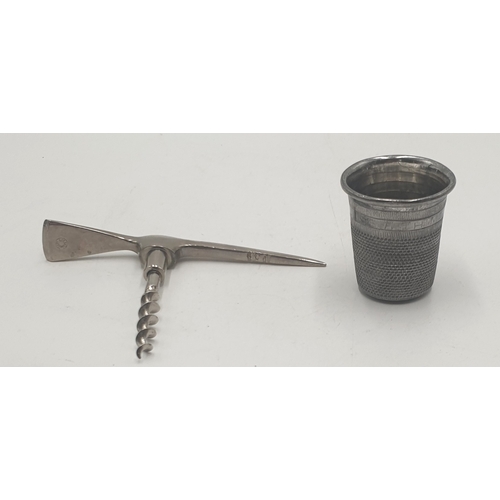 518 - GERMAN NOVELTY BOTTLE STOPPER FASHIONED AS A PICKAXE Signed TOGETHER WITH NOVELTY SHOT THIMBLE