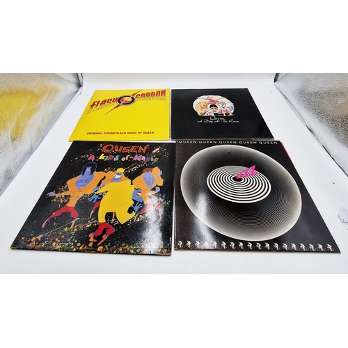 758 - QUEEN VINYL ALBUMS (4)
Flash + inner. A Day At The Races gatefold + Inner. A Kind Of Magic + inner (... 