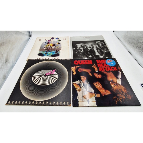 759 - QUEEN VINYL ALBUMS (4)
Innuendo + inner (water damaged sleeve and inner). The Game + Inner. Sheer He... 