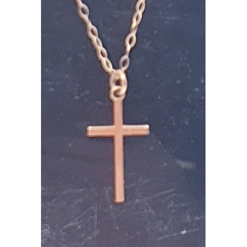 223 - 9ct GOLD (375) CROSS PENDANT ON A 46cm NECK CHAIN (Total Weight 1.2 Grams)