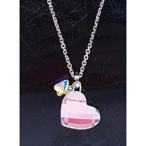 23 - SWAROVSKI CRYSTAL PURPLE HEART PENDANT ON A 40cm NECK CHAIN (Boxed)