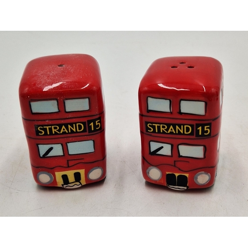 30 - CERAMIC CRUET SET FASHIONED AS TWO DOUBLE DECKER BUSES