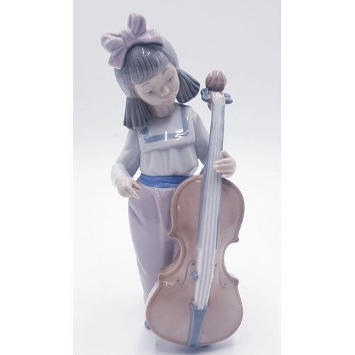 600 - LLADRO (Nao) PORCELAIN Large 19cm CHARACTER FIGURINE OF A YOUNG GIRL With CELLO