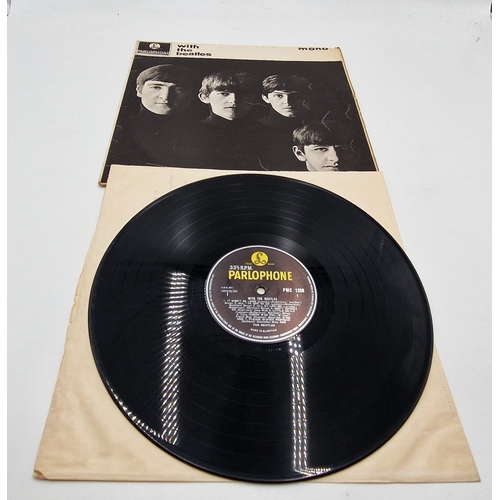 110 - THE BEATLES VINYL LP (1)
WITH THE BEATLES. MONO VERSION WITH FLIPBACK SLEEVE AND YELLOW/BLACK LABELS... 