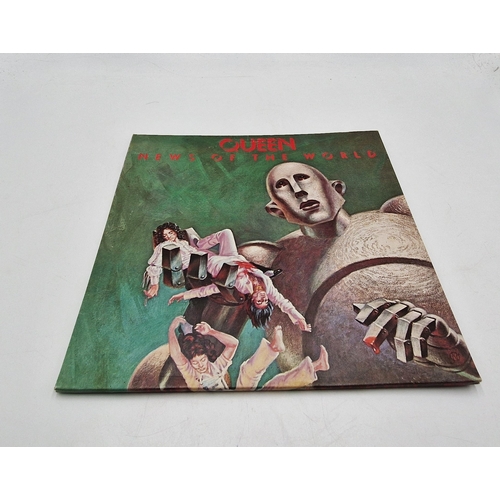 313 - QUEEN VINYL LP (1)
NEWS OF THE WORLD GATEFOLD SLEEVE + INNER. THE VINYL IS VG++. THE SLEEVE IS VG+. ... 