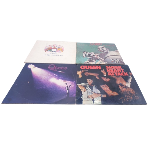 319 - QUEEN VINYL LPS (4)
QUEEN SELF-TITLED./ NEWS OF THE WORLD GATEFOLD SLEEVE + INNER. SHEER HEART ATTAC... 