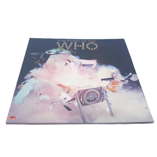 321 - THE WHO VINYL 2LP (1)
THE STORY OF THE WHO GATEFOLD SLEEVE 2LP WITH THE STILL ATTACHED BOOKLET. VERY... 