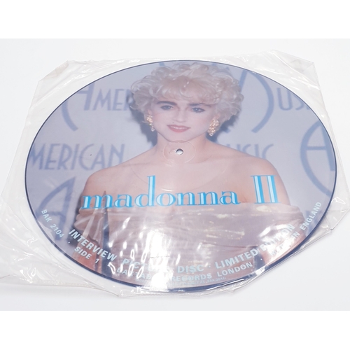 557 - MADONNA PICTURE DISC 12 INCH (1)
INTERVIEW. THE VINYL IS NEAR MINT.