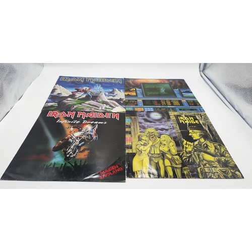 559 - IRON MAIDEN VINYL 12 INCHES (4)
RUN TO THE HILLS. WASTED YEARS. INFINITE DREAMS. WOMEN IN UNIFORM. T... 