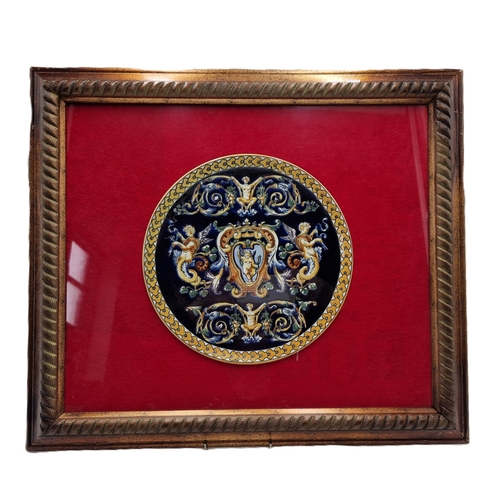 768 - MAJOLICA  PLAQUE MOUNTED IN A WOODEN 53cm x 45cm FRAME.
(Please Note This Lot WILL NOT BE PACKED OR ... 