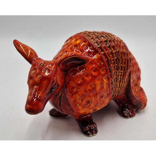 144 - ANITA HARRIS ART POTTERY 15cm x 24cm MODEL OF AN ARMADILLO  (Signed In Gold By Anita Harris)