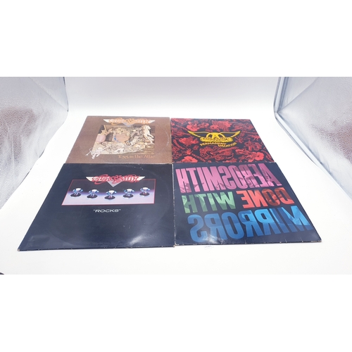 87 - AEROSMITH VINYL LPS (4)
TOYS IN THE ATTIC 1987 REISSUE./ PERMANENT VACATION + INNER./ ROCKS./ DONE W... 