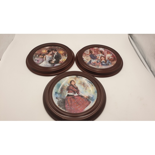 690 - PORCELAINE DE LIMOGES 21.5cm PORCELAIN PLATES (3) FROM THE 'GIGI' SERIES IN WOODEN FRAMES