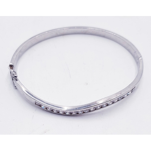 657 - SILVER (925) STONE SET BANGLE (Total Weight 13.3 Grams