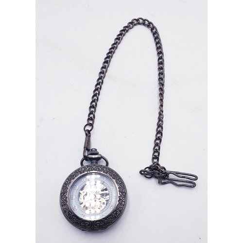 714 - MECHANICAL SKELETON TYPE POCKET WATCH (Found To Be Working When Photographed) ON A WATCH CHAIN