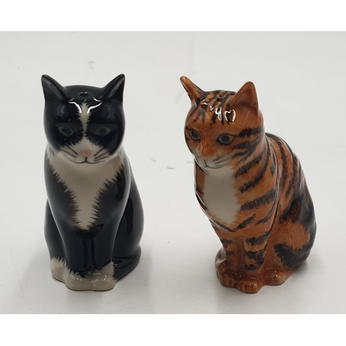 718 - QUAIL POTTERY CRUET SET FASHIONED AS A TWO CATS 