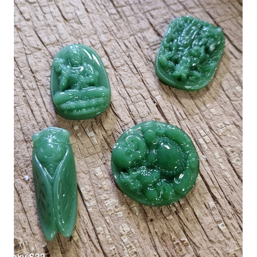 79 - JADE ? CARVED PENDANTS (4)