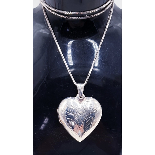 211 - SILVER (925) HEART SHAPED LOCKET ON A SILVER (925 & Hallmarked) 60cm NECK CHAIN  (Total Weight 20 Gr... 