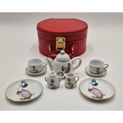 229 - LEATHER VANITY CASE With CERAMIC Miniature TEA SET 