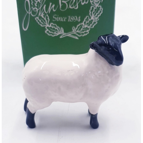 74 - BESWICK 6.4cm MODEL OF A BLACK FACED LAMB (Model No 1828) (Black/White Gloss Colourway) 1963/2002 De... 