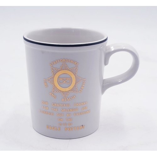 77 - EAGLE POTTERY CHINA MUG (Staffordshire Fire And Rescue Service With Gold Badge And Inscription 