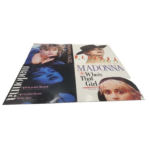 125 - MADONNA VINYL 12 INCH SINGLES (4)
ANGEL. OPEN YOUR HEART. LA ISLA BONITA (EXTENDED REMIX). WHO’S THA... 