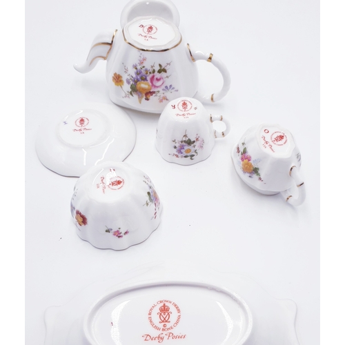 575 - ROYAL CROWN DERBY CHINA Miniature TEASET Plus TRAY IN THE DERBY POSIES DESIGN