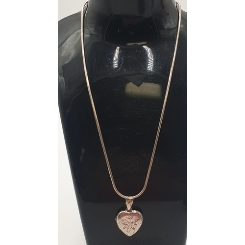 694 - SILVER (925) HEART SHAPED LOCKET ON A SILVER (925) 20cm NECK CHAIN