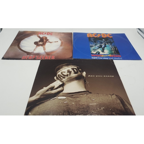 688 - AC/DC VINYL 12 INCH SINGLES (3)
WHO MADE WHO. HEATSEEKER. ARE YOU READY NUMBERED GATEFOLD SLEEVE (NU... 